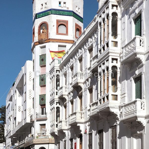 Edificio La Equitativa or Equitable building in the Ensanche or Spanish Expansion area of Tetouan, built in the early 20th century during the time of the Spanish Protectorate of Morocco 1912-56. After the Reconquest of Spain, Tetouan was rebuilt by Andalusian refugees who had been expelled by the Spanish, and the town continued to have a strong Moorish influence in its art and architecture. Picture by Manuel Cohen
